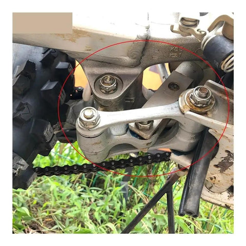 Motorcycle rear linkage showing installed Steering Head Bearing Kit For CRF150R CRF150RB 2022 Motorcycle Suspension Upgrade