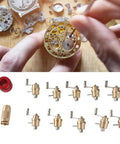 Mainspring Winder Set For Watch Repair Brass Tool Kit with visible winding tools and watch components on wooden surface