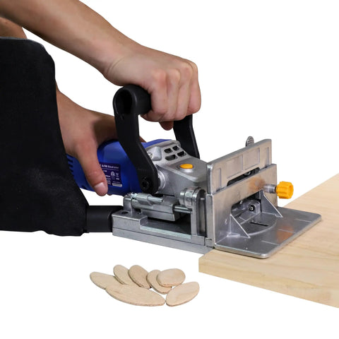 No Sweat Lightweight Electric Biscuit Jointer 760W in use, cutting slots in wood with biscuit pieces visible.