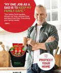 Man holding coffee with All-In-One Fire Safety Kit 6-Piece featuring gel, blankets, and sachets on kitchen counter.