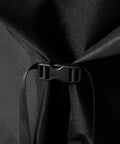 Close-up of cinch strap on Heavy Duty 28 Inch Griddle Cover with Hood for Flat Top Gas Grills, demonstrating secure fit.