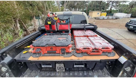 Compact Low Profile Packout Compatible Five Compartment Tool Organizer with bins on a truck bed, organized for workshop use.