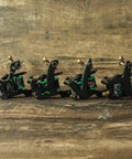 Four Coil Tattoo Machine Kit Set For Lining Shading And Coloring with green coils on wooden background
