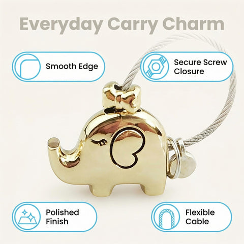Sleek Silver Keychain With Chrome Tone Metal Charm, Screw Closure Wire Rope Loop featuring an elephant charm.