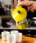 Pouring coffee from a Bold Yellow Stovetop Moka Pot Espresso Maker 300 Ml Cup for Home Barista Quality Coffee Percolator