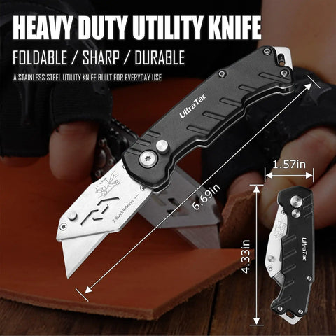 Black heavy-duty utility knife with stainless steel blade, shown open and folded, with measurements 6.69in and 4.33in.
