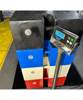 Pro Grade 40 By 40 Inch Heavy Duty Industrial Floor Scale displaying digital readout with colored weight blocks.