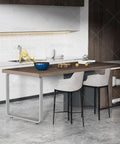 Premium Heavy Duty Metal Table Legs, 28 Inch Industrial Bench Legs Featuring Non Scratch Rubber Foot Pads, Beefy Cold Rolled Steel Desk Replacement Feet For Diy Dining And Home Bar Projects in modern kitchen setting.