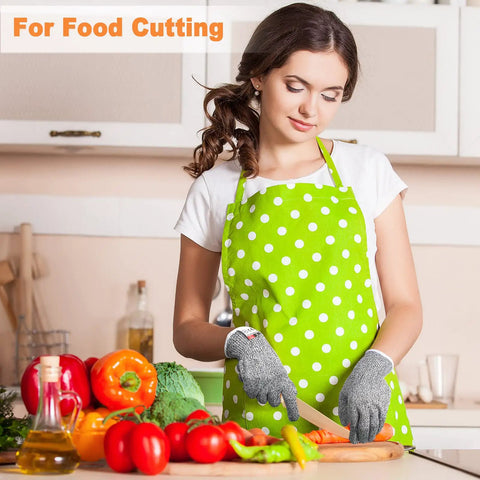 Woman wearing 15 Pairs Cut Resistant Gloves Level 5 Protection Anti Cut Kitchen Gloves for food prep, slicing vegetables in kitchen.