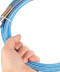 Hand holding blue PTFE High Temperature Steam Hose For Steam Irons High Pressure Tube Lightweight And Durable Steam Line