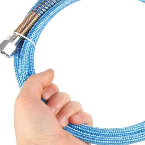 Hand holding blue PTFE High Temperature Steam Hose For Steam Irons High Pressure Tube Lightweight And Durable Steam Line
