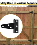 8 Pcs T Strap Gate Hinges Heavy Duty 2 Inch Black Iron Tee Shed Hinges With Mounting Screws installed on wooden fence gate.