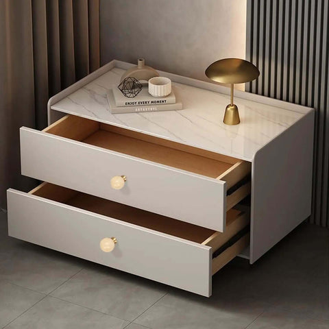 Slick Modern Brush Brass Crystal Round Ball Knobs For Dresser Drawers And Vanity Cabinets With 1 1/4 Inch Diameter in use on a sleek drawer.