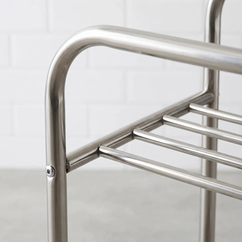 Close-up of stainless steel frame of Floor Standing Metal Storage Rack For Laundry And Home Organization Movable And Rust Resistant