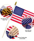 Image of six pack 4x6 inch small American flags on wooden sticks handheld USA flags with kid safe spear top for outdoor use.