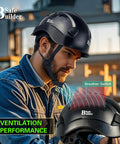 Heavy Duty Abs Safety Helmet With Built In Visor And Quick Air Vent Osha Certified For Actual Job Sites Giving Rock Solid Head Protection In Classic Black Finish worn by a man in a construction setting.