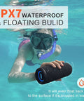 Person swimming underwater with Wireless Portable Speaker With 25W Bangin Bass And Bassboom Technology IPX7 Waterproof Bluetooth Speaker TWS Pairing Built In Mic 16 Hour Playtime With Lights For Home And Outdoor Fun