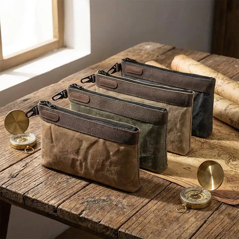 Waxed Canvas Tool Pouches 4 Pack, 11-Inch Heavy-Duty Zipper Tool Bags Set on wooden table, compass and map nearby
