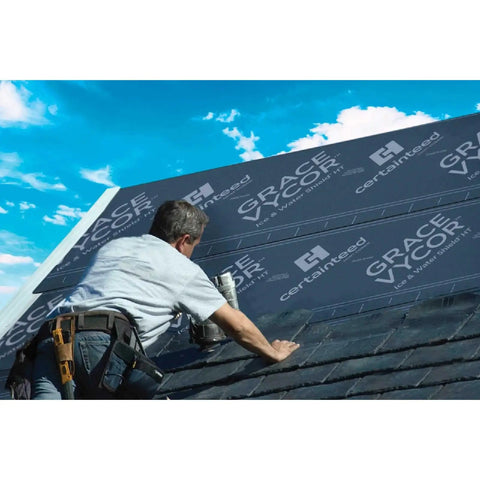 Rock Solid Beat The Heat Ice And Water Shield Roofing Underlayment Self Adhering Rubberized Asphalt applied by roofer on sloped roof.