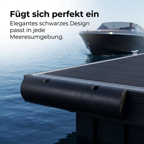 Black beefy rubber dock bumper and semi circular dock guard for outer wheel docks and ports, marine grade heavy duty rub rail.