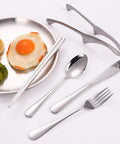 Outdoor Camping Mess Kit For Two With Stainless Steel forks spoons knives plates and food clip on a white background