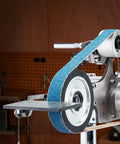 Heavy Duty Belt Grinder Sander With Smooth Operator Variable Speed VFD And 550 Watt Motor showing a close-up view of the sanding belt and metal platen.
