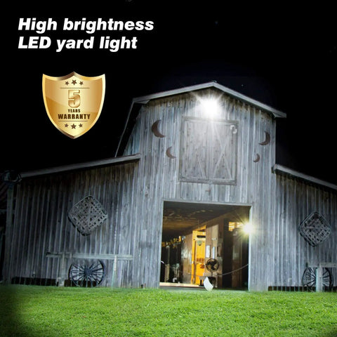18000LM LED Barn Light 120W 5000K Dusk To Dawn Outdoor Security Flood Light illuminating a barn at night.