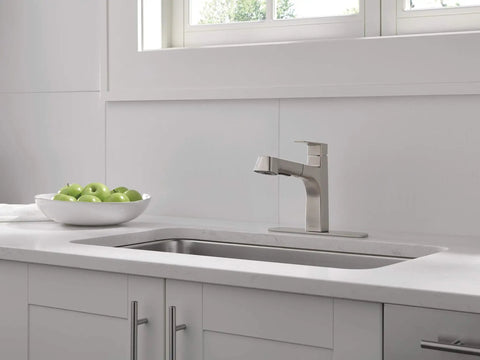 Xander Pull Out Kitchen Faucet With Sprayer Stainless Steel mount on modern kitchen sink with apples in a bowl