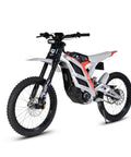 Adult Electric Dirt Bike Built To Shred With Raw Torque And 53 MPH Top Speed, side view showcasing hydraulic brakes and knobby tires.