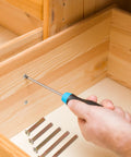 Assembly with Grab And Go 49 Piece M6 Hex Socket Screws And Barrel Nuts Set for furniture repair, showing screws and screwdriver use