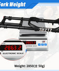 26 Inch Fat Tire Front Fork With Air Suspension For Mountain Bikes, 180mm Travel, on electronic scale showing 2863.2g.