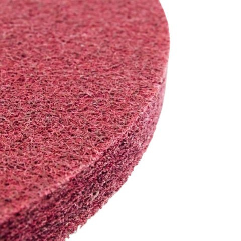 Close-up of a 7 Inch Non Woven Surface Prep Disc, aluminum oxide material, ideal for rust removal on angle grinders.