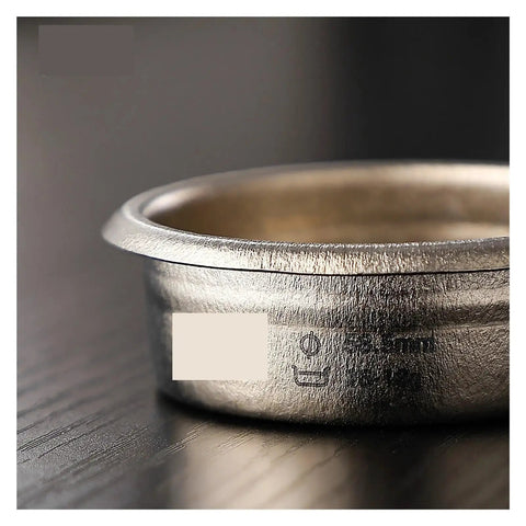 Dope Titanium Espresso Distributor And Ground Leveling Tool For Even Coffee Bed Prep In 58.5mm Portafilter Baskets close-up view.