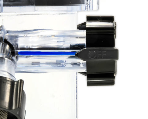 Close-up of Dual Flush Pro RV Holding Tank Rinser gate valve system and reverse flush valve, showing black and clear design components.
