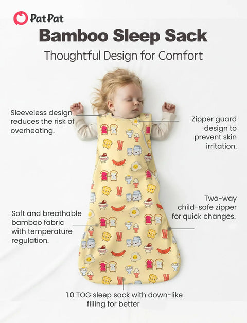 Infant sleeping in Soft Bamboo Viscose Baby Sleep Sack 1.0 TOG For 0-6 Months, Breakfast Friends design, sleeveless, breathable.