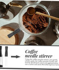 Game Changer 3 Piece Espresso Coffee Powder Stirrer Set Heavy Duty Stainless Steel Wands and Precision Needles in a bowl of coffee grounds.