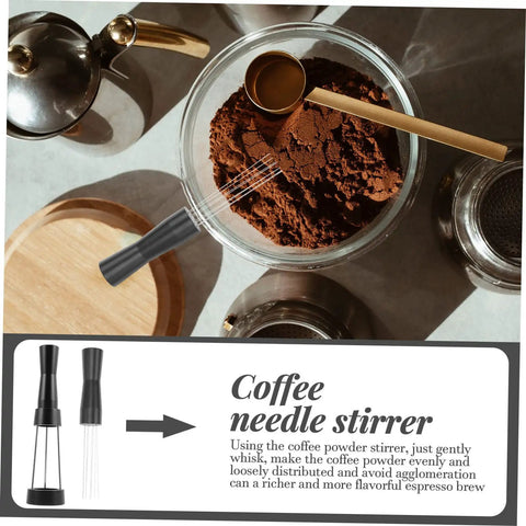 Game Changer 3 Piece Espresso Coffee Powder Stirrer Set Heavy Duty Stainless Steel Wands and Precision Needles in a bowl of coffee grounds.