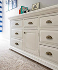 Side view of a white dresser with antique brass cup pulls 3 inch center 10 pack vintage drawer pulls for kitchen cabinets bathroom vanities and dressers durable zinc alloy hardware classic cabinet handles and knobs with retro vibe and timeless look.