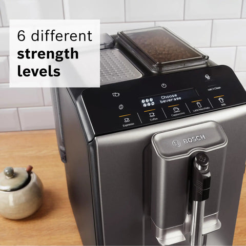 Fully Automatic Espresso Machine With Milk Frother System And Touch Control Panel Plus Cup Warmer For One Touch Latte And Cappuccino Maker In Sleek Dark Silver showing touchscreen with beverage selection.