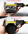 Measuring Chevrolet Blackout USA Flag Wheel Center Cap outer 83mm, inner 73mm with a caliper, showing size for compatibility