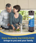 Couple in kitchen with 1 Micron 10 Inch By 2 Point 5 Inch Whole House CTO Carbon Water Filter Cartridge Replacement For Home Filtration Systems 4 Pack Reduces Chlorine Up To 99 Percent Plus Sand Rust Sediment And Color BPA Free Food Grade Materials.