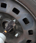 Magnetic 16 Piece Nut Driver Set For Impact Drill And Driver With Deep Quarter Inch Hex Shank in use on tire lug nut