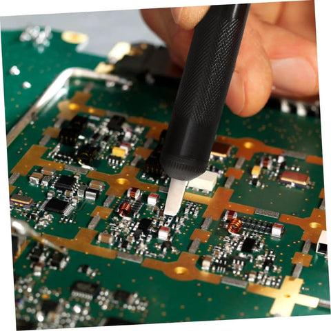 Using 7 Piece Soldering Repair Tool Kit With Desoldering Pump And Wick on a circuit board for maintenance