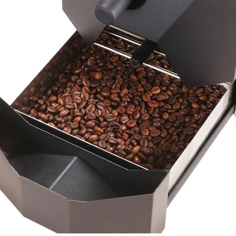 Automatic Electric Air Coffee Bean Roaster With Three Roasting Programs and Nine Professional Baking Curves showing roasted coffee beans in the chaff catcher.