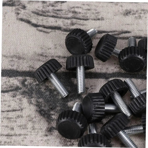 Twenty Adjustable Furniture Leveling Cups With Threaded Socket Design, black plastic and metal bolts on a textured surface.