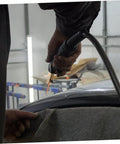Auto Dent Repair Welding Hammer Kit With Precision Iron Needle and High Strength Magnets in action on car panel.
