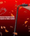 Hand holding handle of Heavy Duty 4 Inch By 10 Foot Leaf Vacuum Kit With Mulcher Shredder Attachment against red background with leaves.