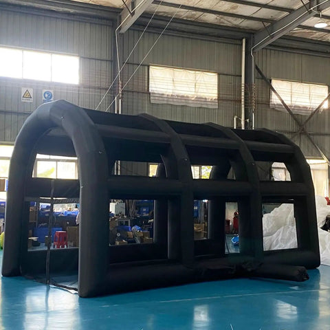 Black Inflatable Tennis Court Style Tent And Baseball Batting Cage With Blower Portable 19.68 Ft By 9.84 Ft in warehouse setting