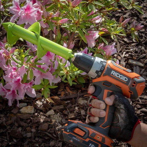 Auger Drill Bit For Planting Bulbs And Flowers Digs Holes Fast 3.5 By 8.5 Inch Garden Bedding Plant Auger in use with drill