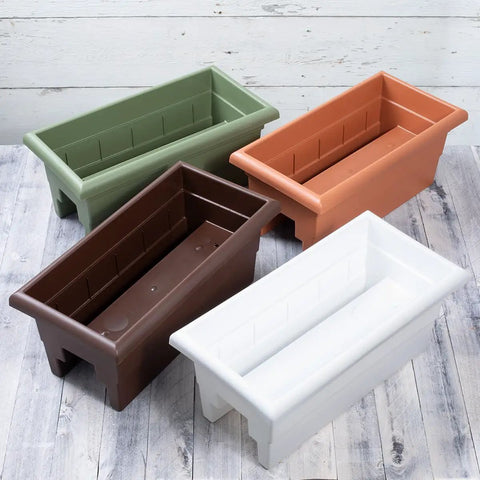 Four rail planters in green, orange, brown, and white, each 24-inch, made from fade-resistant plastic with drainage plugs.